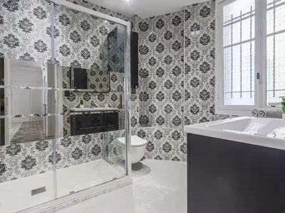 a bathroom with a shower and a sink and a toilet at Apartment Le Rossi by Interhome in Nice