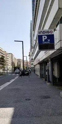 a building with a sign for aido pro pharmacy at Nice Seaview Free Parking 4.Pers in Nice