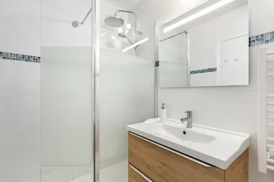 a bathroom with a sink and a shower at Studio Massenet Five stars holiday house in Nice