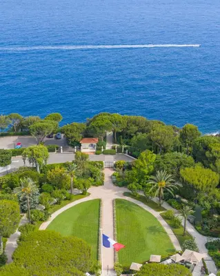 a view of the ocean from the balcony of a hotel at Grand-Hôtel du Cap-Ferrat, A Four Seasons Hotel in Saint-Jean-Cap-Ferrat