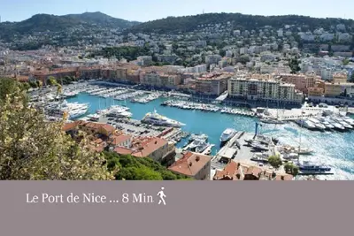 a view of a harbor with boats in the water at Nice Central Art Deco Flat 45 m² in Nice