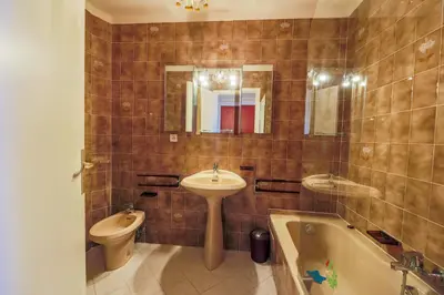 a bathroom with a sink and a tub and a toilet at RESIDENCE DU CAP AP2027 - Villefranche-sur-Mer, by Riviera Holiday Homes in Villefranche-sur-Mer