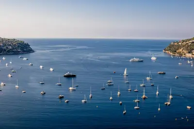 a large group of boats in a large body of water at RESIDENCE DU CAP AP2027 - Villefranche-sur-Mer, by Riviera Holiday Homes in Villefranche-sur-Mer