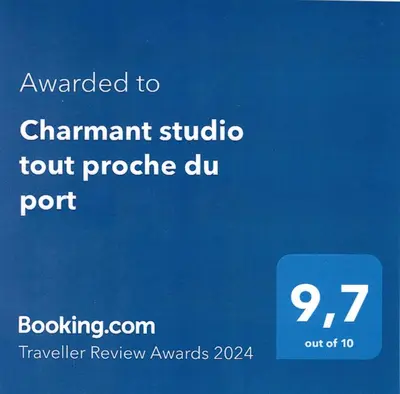 a screenshot of a cell phone with a sign that saysauthorized tochamant studio at Charmant studio tout proche du port in Nice