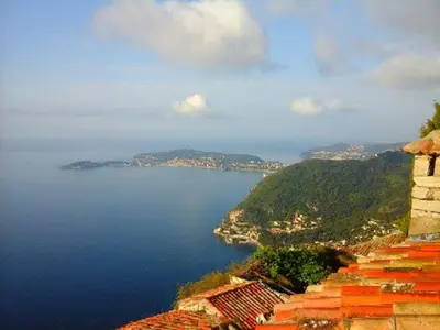 a view of a large body of water from a castle at La Suite du Village d'Eze in Èze