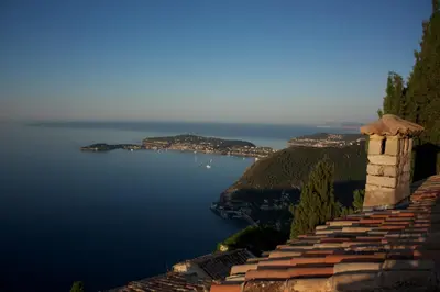 a view of a large body of water from a castle at La Suite du Village d'Eze in Èze