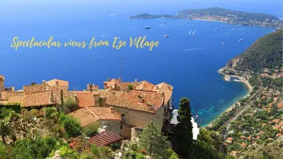 a castle on a hill next to a body of water at La Suite du Village d'Eze in Èze