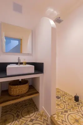 a bathroom with a sink and a mirror at Ze Perfect Place - Vieux Nice - Exceptionnel Appartement - Calme et Terrasse avec vues in Nice