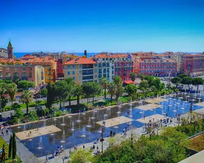 a view of a city with a river and buildings at Nestor&Jeeves - FIORA PARADISE TERRACE - Central - Very close sea in Nice