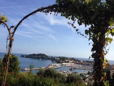 a view of a harbor with boats in the water at 