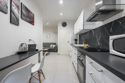 a kitchen with a counter top and a microwave at Charming 1 Bdr Old town in Nice