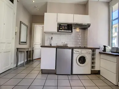 a kitchen with a washer and dryer in it at Nestor&Jeeves - LILAS BUFFA - Central - Close sea - Top Floor in Nice
