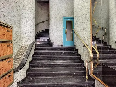 a staircase with a blue door in a building at Nestor&Jeeves - NEVADA SUITE - Central - Close sea in Nice