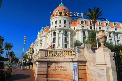 a large white building with a sign on it at Nestor&Jeeves - NEVADA SUITE - Central - Close sea in Nice