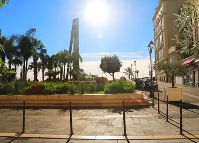 a park with a bench in the middle of a street at Jade Duplex - No Better Location In Nice in Nice