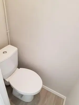 a bathroom with a white toilet in a room at Cosy central studio Nice Rossini large balcony in Nice