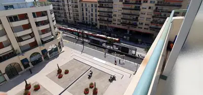 an overhead view of a city street with a train at Alery apartment Nice terrace AC wifi by Affitto-Nizza in Nice