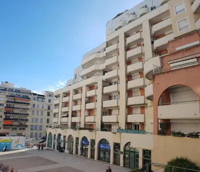 a large apartment building in a city at Alery apartment Nice terrace AC wifi by Affitto-Nizza in Nice