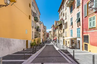 an empty street in a city with buildings at COCOON BEACH Central Proche Mer in Nice
