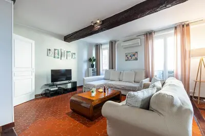 a living room with a couch and a coffee table at Large 3 Bdr Old Town - AC in Nice
