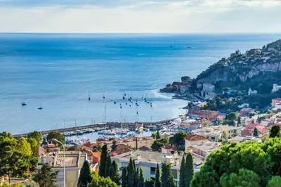 a view of a harbor with boats in the water at Luxurious Penthouse with panoramic view in Villefranche-sur-Mer