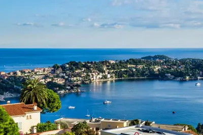 a view of a bay with boats in the water at Luxurious Penthouse with panoramic view in Villefranche-sur-Mer