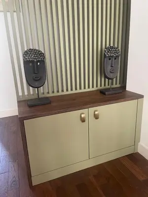 two masks sitting on top of a cabinet at Appartement moderne 4p hypercentre de nice in Nice