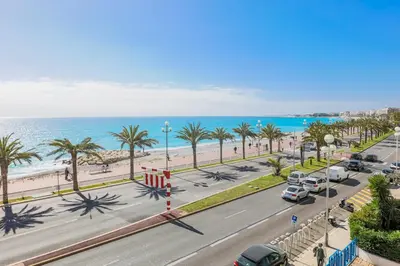 an aerial view of a street with palm trees and the ocean at LE FLORIDE AP4156 Nice, by Riviera Holiday Homes in Nice