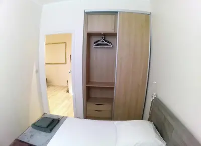 a bedroom with a closet and a bed in it at Apartment in the heart of Nice in Nice
