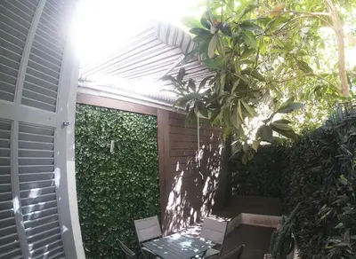 a patio with a fence and a table and chairs at Apartment in the heart of Nice in Nice