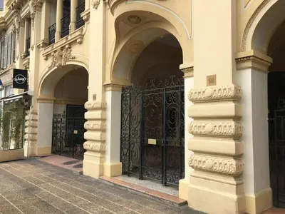 an entrance to a building with a black gate at Belle Epoque Studio in Nice