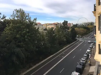 a highway with cars parked on the side of the road at Belle Epoque Studio in Nice