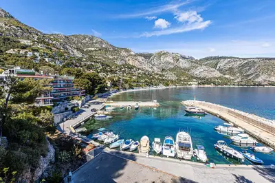 a group of boats docked in a harbor at Appartement Eze bord de mer in Èze