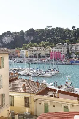 a harbor with boats in the water and buildings at AIGUE-MARINE - Superbe appartement Vue Mer 4 personnes au Port de Nice in Nice