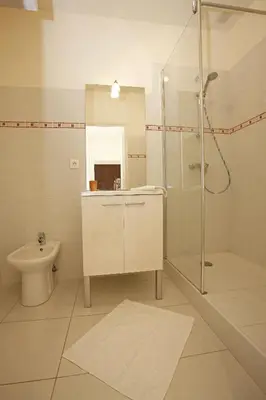 a bathroom with a shower and a sink and a toilet at AIGUE-MARINE - Superbe appartement Vue Mer 4 personnes au Port de Nice in Nice