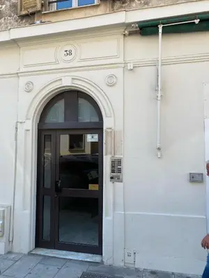 an entrance to a building with a black door at AIGUE-MARINE - Superbe appartement Vue Mer 4 personnes au Port de Nice in Nice