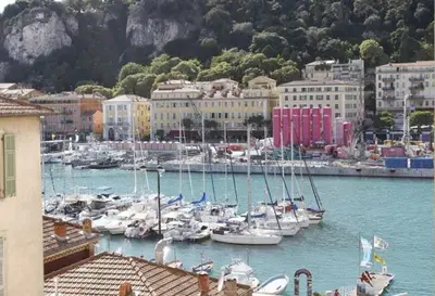a bunch of boats are docked in a harbor at AIGUE-MARINE - Superbe appartement Vue Mer 4 personnes au Port de Nice in Nice