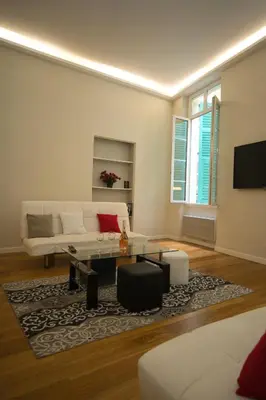 a living room with a couch and a table at Old Town Luxury 3 Beds in Nice
