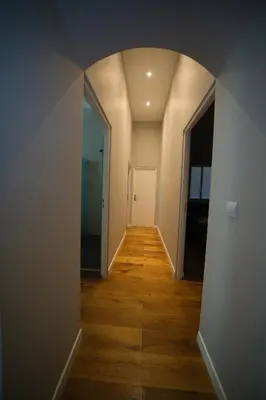 an empty hallway with a hallway leading into a room at Old Town Luxury 3 Beds in Nice
