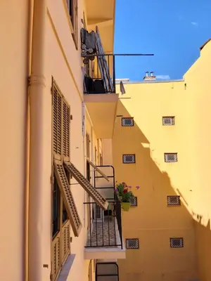 an alley with stairs in an italian building at Studio Lou Nidou, Nice Centre in Nice