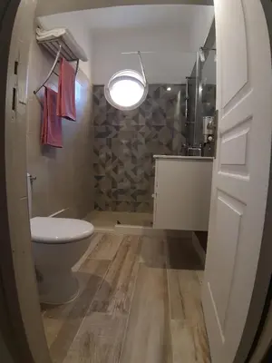 a bathroom with a toilet and a sink at Studio Lou Nidou, Nice Centre in Nice