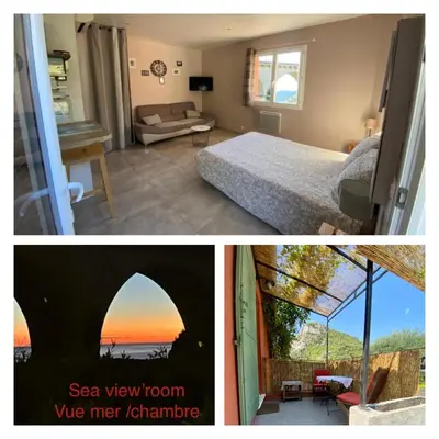 a room with a bed and a view of the ocean at STUDIO pied village EZE - dans VILLA - Parking Gratuit in Èze