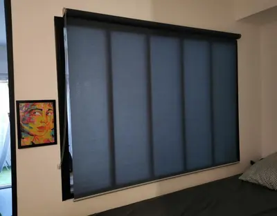 a window with a blue blind in a bedroom at Alex Nice Studio in Nice