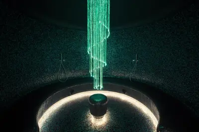 a string of green lights hanging from a ceiling at Les Terrasses d'Eze - Hôtel & Spa in Èze