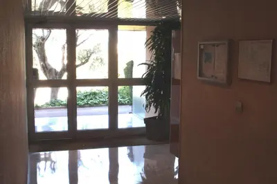 a door leading to a patio with a window at Studio Le Fabrina Riviera in Nice