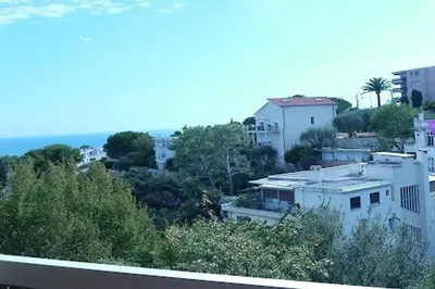 a view of a city with trees and buildings at AZURELLE in Nice