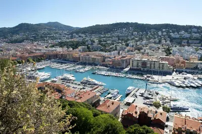 a view of a harbor with boats in the water at Appart Hotel Garibaldi in Nice