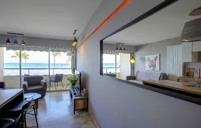a living room with a view of the ocean at Flat design with SEA view promenade des anglais in Nice