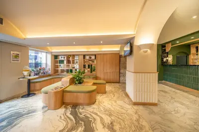 a lobby of a hotel with a waiting room at Hotel Boréal Nice in Nice