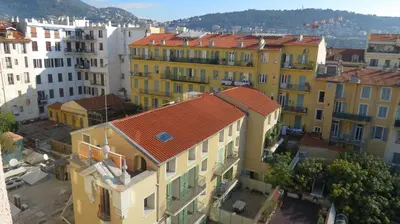 an aerial view of a city with buildings at Campanile Hotel Nice Centre Acropolis in Nice